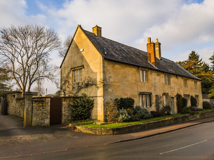 old medieval cottage cotswolds england UK