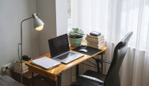 Simple home office setup with a table and laptop